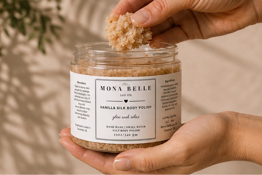 Taking a scoop of Lemongrass Mist Body Polish from the jar